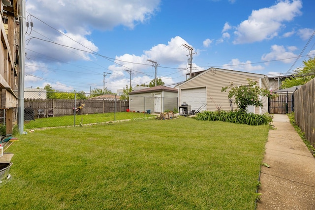 3340 W Polk St, Chicago, IL 60624 - view of yard with a detached garage and an outbuilding