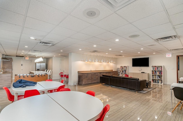 1221 N Dearborn St Unit 207N, Chicago, IL 60610 - dining room featuring a community bar, baseboards, a drop ceiling, and recessed lighting