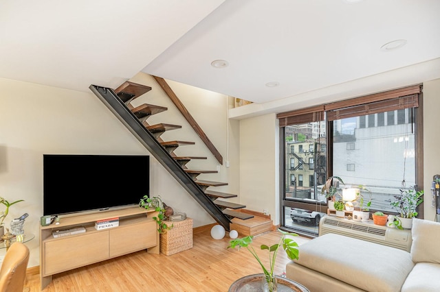 1221 N Dearborn St Unit 207N, Chicago, IL 60610 - living area featuring stairs, wood finished floors, baseboards, and recessed lighting
