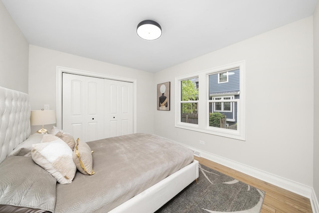 504 Newton Ave, Glen Ellyn, IL 60137 - bedroom featuring wood finished floors, baseboards, and a closet