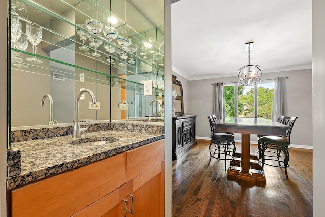 10 Black Walnut Trl, Palos Park, IL 60464 - dining room with ornamental molding, dark wood-style floors, and bar with sink
