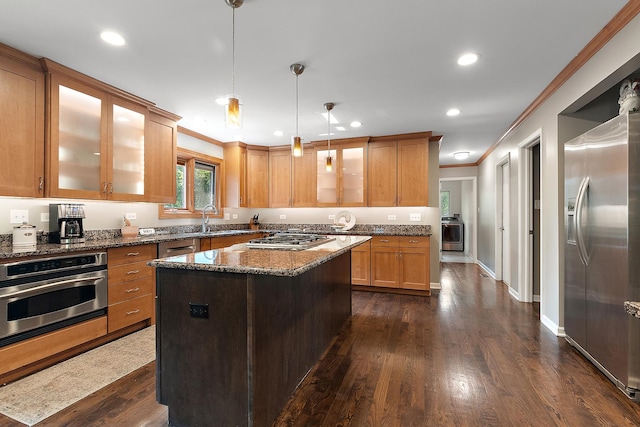 10 Black Walnut Trl, Palos Park, IL 60464 - kitchen featuring appliances with stainless steel finishes, ornamental molding, dark stone countertops, dark wood-style floors, and glass insert cabinets