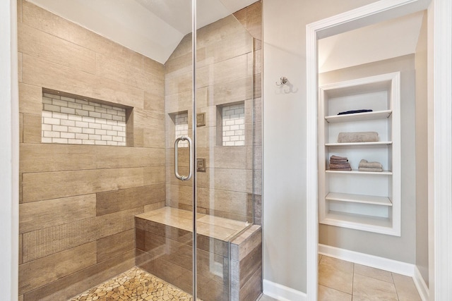 10 Black Walnut Trl, Palos Park, IL 60464 - bathroom with a shower stall, vaulted ceiling, tile patterned floors, a sauna / steam room, and built in features
