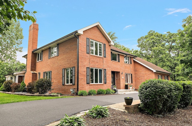 10 Black Walnut Trl, Palos Park, IL 60464 - view of front of home with a chimney and brick siding