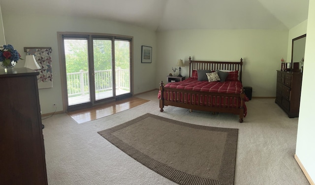 957 Chancery Ln, Cary, IL 60013 - carpeted bedroom featuring vaulted ceiling, access to outside, multiple windows, and baseboards