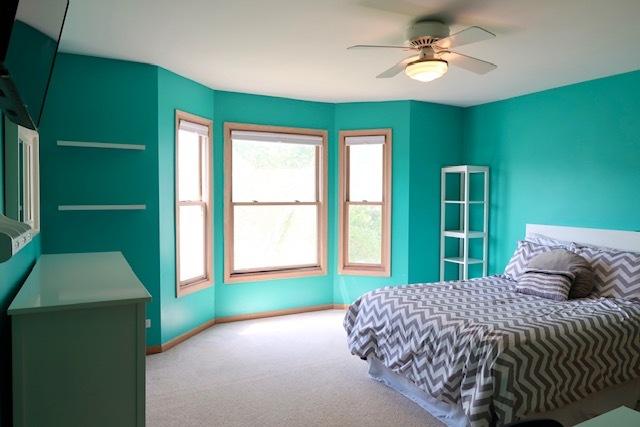 957 Chancery Ln, Cary, IL 60013 - carpeted bedroom featuring baseboards and ceiling fan