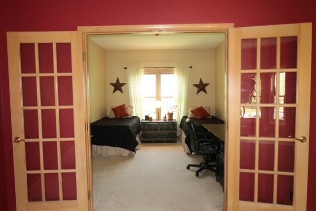 957 Chancery Ln, Cary, IL 60013 - carpeted bedroom with a desk and french doors