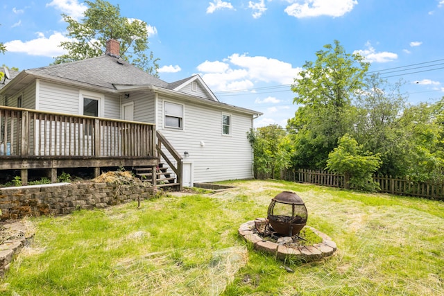 1729 S Hamilton St, Lockport, IL 60441 - back of house featuring a fire pit, a chimney, a wooden deck, roof with shingles, and stairway