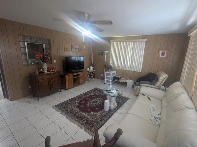 8918 S Euclid Ave, Chicago, IL 60617 - living area featuring a ceiling fan, light tile patterned floors, and wood walls