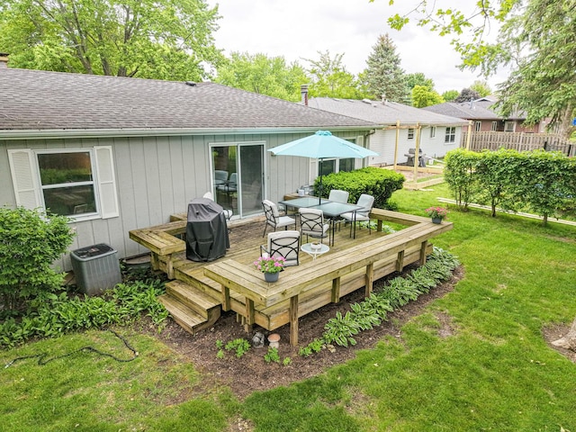 1720 Brookhill Ln, Sycamore, IL 60178 - wooden terrace with outdoor dining area, a yard, and central AC unit