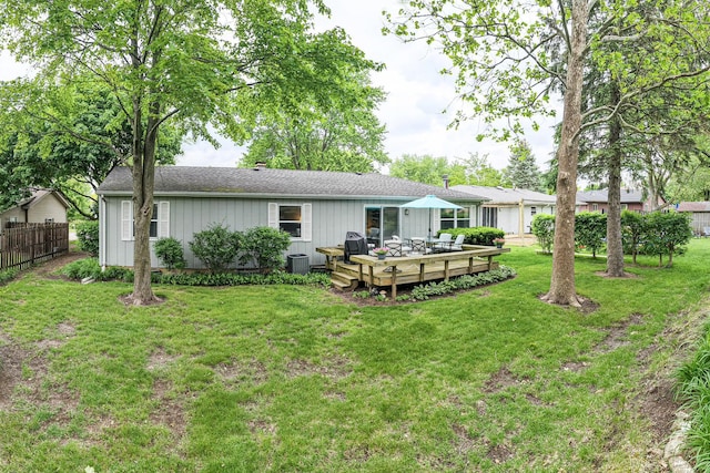 1720 Brookhill Ln, Sycamore, IL 60178 - back of house with a wooden deck, roof with shingles, and board and batten siding