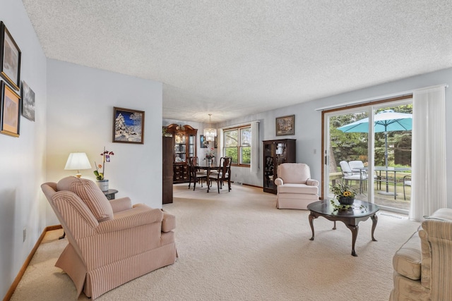 1720 Brookhill Ln, Sycamore, IL 60178 - living room with light carpet, a textured ceiling, healthy amount of natural light, and baseboards
