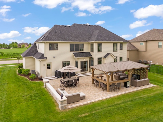 4328 Chinaberry Ln, Naperville, IL 60564 - back of house with an outdoor hangout area, a patio, central AC, and a shingled roof