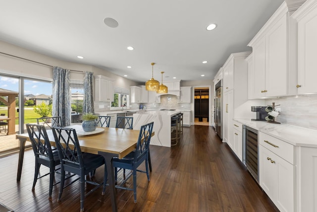 4328 Chinaberry Ln, Naperville, IL 60564 - dining room with beverage cooler, healthy amount of natural light, recessed lighting, and dark wood-style flooring
