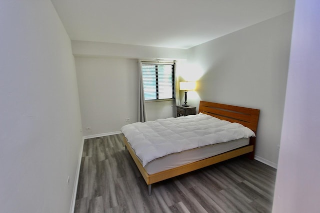 10 Old Oak Dr Unit 103, Buffalo Grove, IL 60089 - bedroom with wood finished floors and baseboards