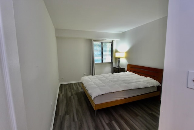 10 Old Oak Dr Unit 103, Buffalo Grove, IL 60089 - bedroom featuring dark wood finished floors and baseboards