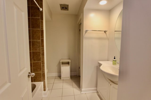10 Old Oak Dr Unit 103, Buffalo Grove, IL 60089 - bathroom with tile patterned floors, vanity, baseboards, and tub / shower combination