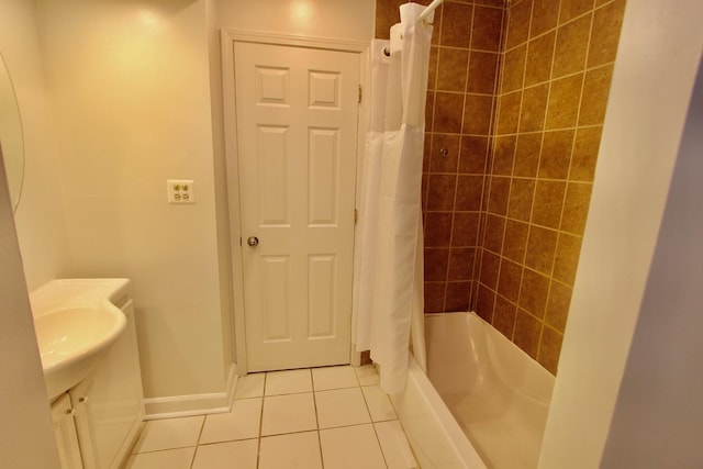 10 Old Oak Dr Unit 103, Buffalo Grove, IL 60089 - full bathroom with tile patterned flooring, baseboards, and shower / bath combo with shower curtain