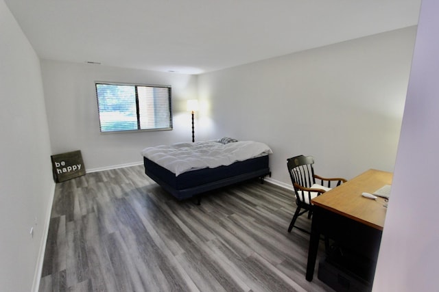 10 Old Oak Dr Unit 103, Buffalo Grove, IL 60089 - bedroom with wood finished floors and baseboards