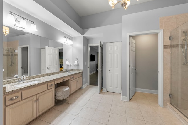 1728 Elyse Ln, Naperville, IL 60565 - full bathroom featuring a chandelier, a shower stall, double vanity, and tile patterned floors