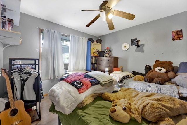 1499 Raven Dr, Bolingbrook, IL 60490 - bedroom featuring wood finished floors and a ceiling fan