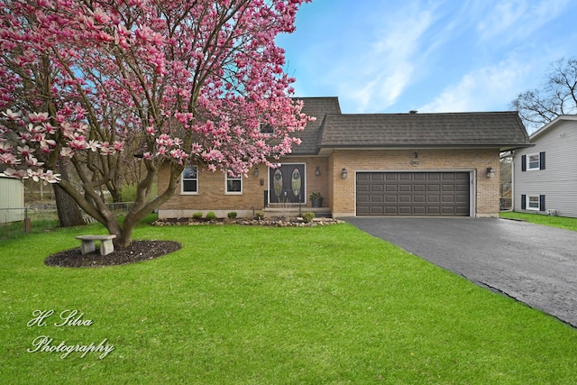 1402 Winaki Trl, Algonquin, IL 60102 - view of front of house with mansard roof, brick siding, driveway, roof with shingles, and a garage