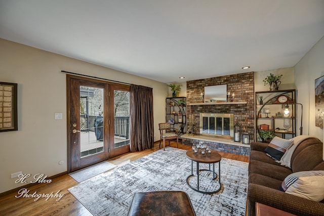 1402 Winaki Trl, Algonquin, IL 60102 - living room featuring wood finished floors, baseboards, a fireplace, and recessed lighting