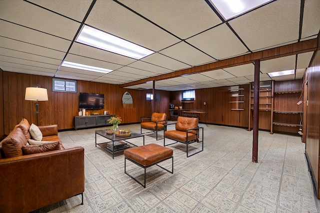 1402 Winaki Trl, Algonquin, IL 60102 - living area featuring healthy amount of natural light, wood walls, and a drop ceiling