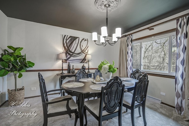 1402 Winaki Trl, Algonquin, IL 60102 - dining space featuring a chandelier, carpet floors, and baseboards