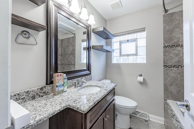 7817 Menard Ave, Burbank, IL 60459 - full bathroom with vanity, tile patterned floors, toilet, and baseboards