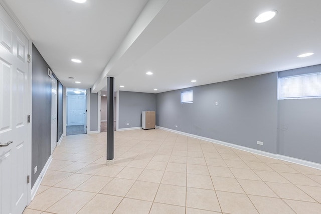 7817 Menard Ave, Burbank, IL 60459 - basement with light tile patterned flooring, baseboards, and recessed lighting