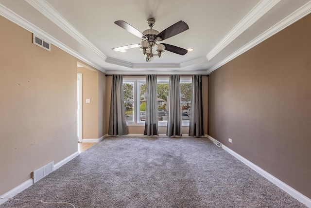 7817 Menard Ave, Burbank, IL 60459 - empty room with a raised ceiling, ornamental molding, ceiling fan, carpet floors, and baseboards
