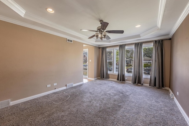 7817 Menard Ave, Burbank, IL 60459 - carpeted empty room featuring a tray ceiling, ornamental molding, ceiling fan, baseboards, and recessed lighting