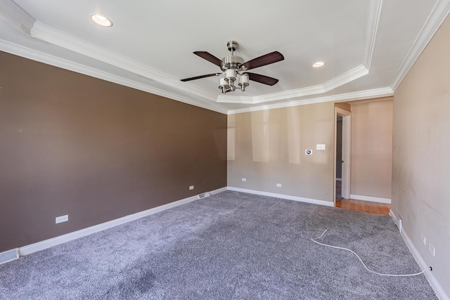 7817 Menard Ave, Burbank, IL 60459 - unfurnished room featuring carpet floors, ceiling fan, ornamental molding, baseboards, and a raised ceiling