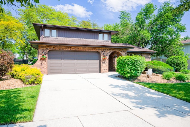 14207 Concord Dr, Orland Park, IL 60462 - view of front facade with brick siding, driveway, and an attached garage