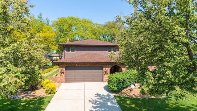 14207 Concord Dr, Orland Park, IL 60462 - view of front of home featuring brick siding, driveway, an attached garage, a chimney, and a shingled roof