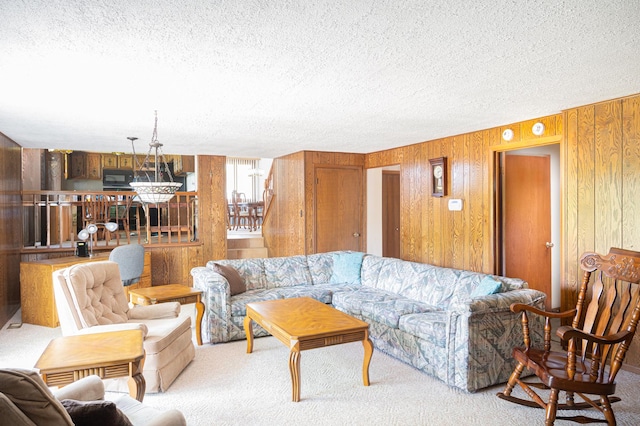14207 Concord Dr, Orland Park, IL 60462 - living room featuring a textured ceiling, carpet, and wooden walls