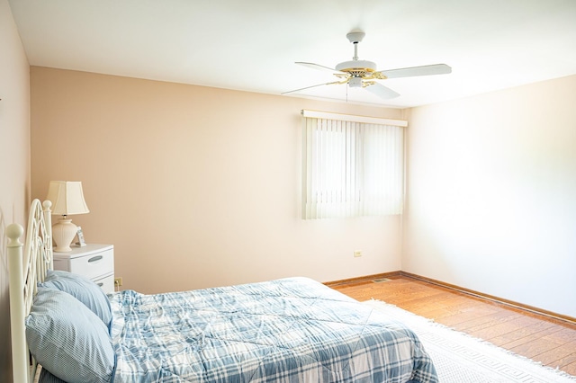 14207 Concord Dr, Orland Park, IL 60462 - bedroom featuring light wood-style flooring, baseboards, and ceiling fan