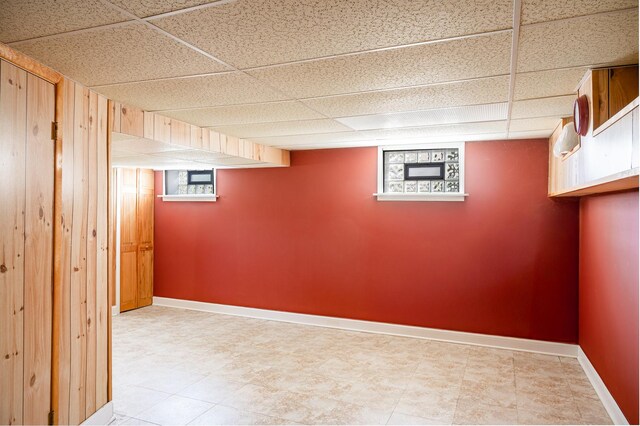 14207 Concord Dr, Orland Park, IL 60462 - below grade area featuring a paneled ceiling and baseboards