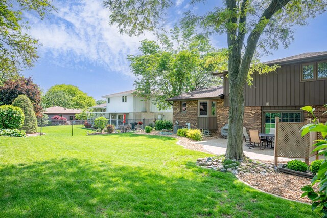 14207 Concord Dr, Orland Park, IL 60462 - view of yard featuring a patio