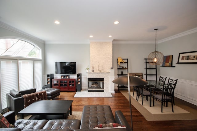 235 S Marion St Unit C, Oak Park, IL 60302 - living room with ornamental molding, wood finished floors, recessed lighting, a stone fireplace, and a chandelier