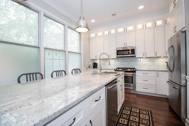 235 S Marion St Unit C, Oak Park, IL 60302 - kitchen with stainless steel appliances, a sink, crown molding, white cabinets, and recessed lighting