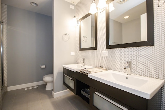 235 S Marion St Unit C, Oak Park, IL 60302 - full bath with toilet, double vanity, baseboards, a shower with door, and tile patterned flooring