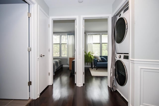 235 S Marion St Unit C, Oak Park, IL 60302 - laundry area with estacked washer and dryer and dark wood finished floors