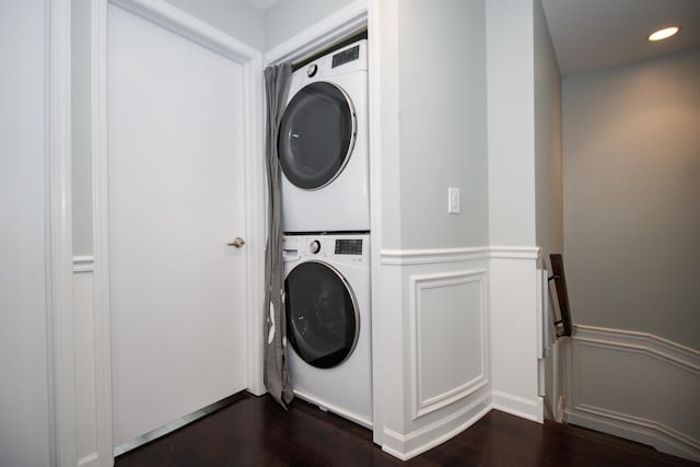 235 S Marion St Unit C, Oak Park, IL 60302 - washroom featuring stacked washing machine and dryer, a wainscoted wall, a decorative wall, dark wood-type flooring, and recessed lighting