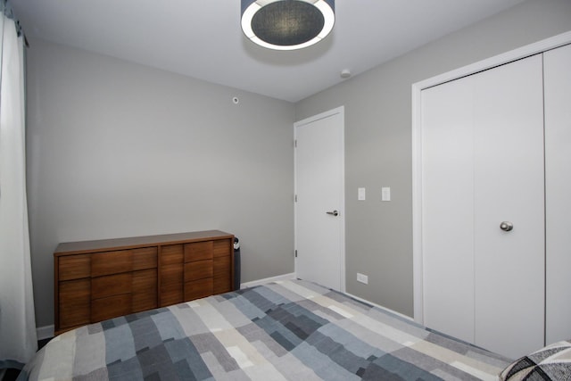235 S Marion St Unit C, Oak Park, IL 60302 - bedroom featuring a closet and light carpet