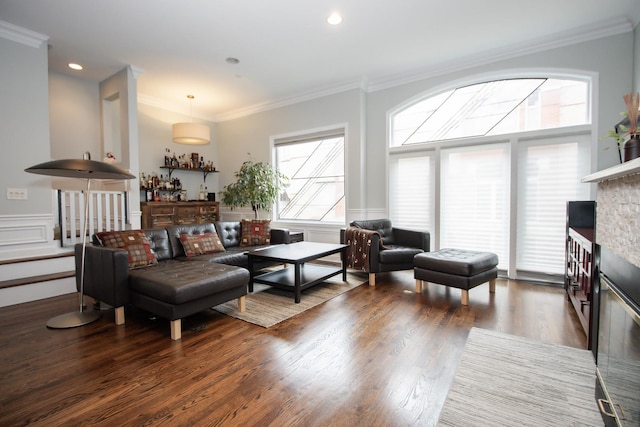 235 S Marion St Unit C, Oak Park, IL 60302 - living room featuring a fireplace, crown molding, wood finished floors, a decorative wall, and wainscoting
