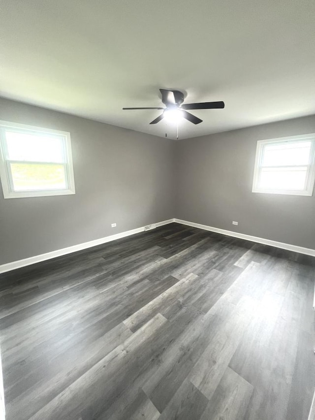 16759 Forest View Dr, Tinley Park, IL 60477 - unfurnished room featuring baseboards, ceiling fan, and dark wood-style flooring