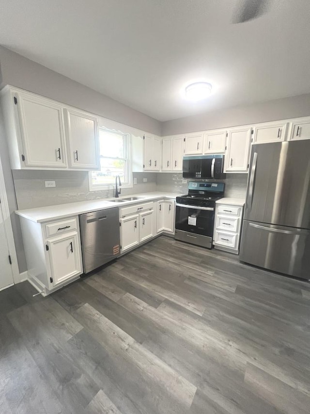 16759 Forest View Dr, Tinley Park, IL 60477 - kitchen with appliances with stainless steel finishes, a sink, light countertops, and white cabinets