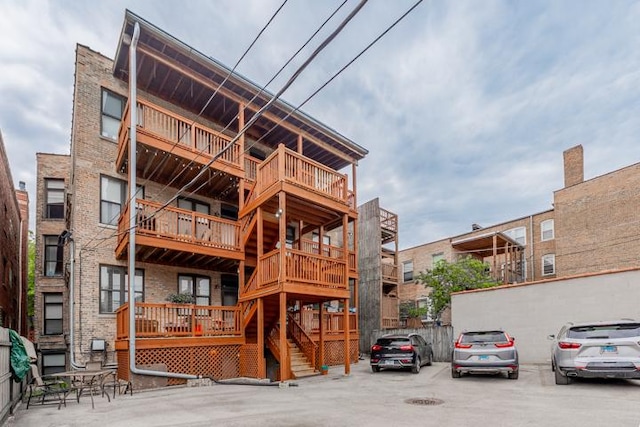 4111 N Kenmore Ave Unit 1Ng, Chicago, IL 60613 - view of property featuring uncovered parking